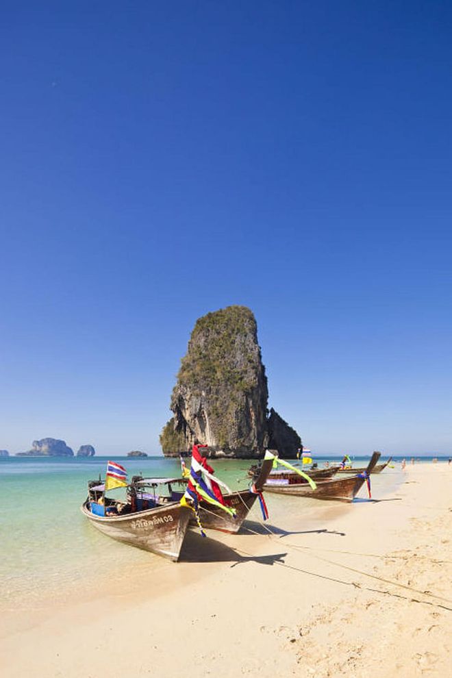 Cut off from the rest of the mainland of Krabi province by high limestone cliffs, Railay Beach is only accessible by boat, making it one of Thailand's most peaceful and beautiful beaches.