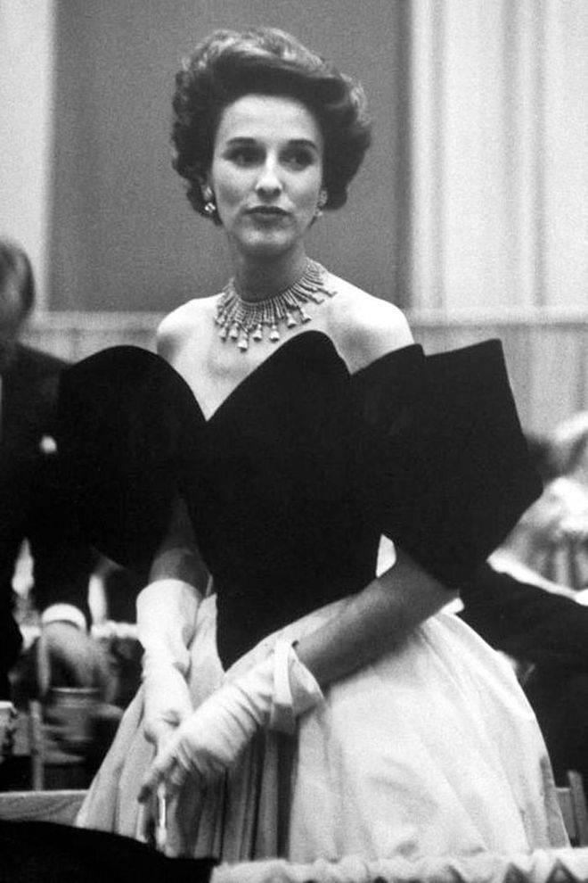 At the height of her fame in the '50s, socialite Babe Paley inspired scores of women with her approach to mixing high and low fashion. An iconic image of her with a scarf tied around her handbag sparked a trend that remains popular today. She dressed purely for own pleasure, embracing Fulco di Verdura jewels with luxe sable coats and chic, cheap costume jewelry.