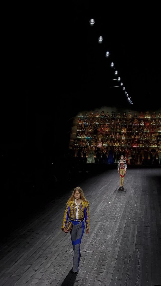 At Louis Vuitton AW2020, models walked to the strains of Grigny’s suite de tierce, a 200-strong live choir, dressed in mid century fashion from past eras.