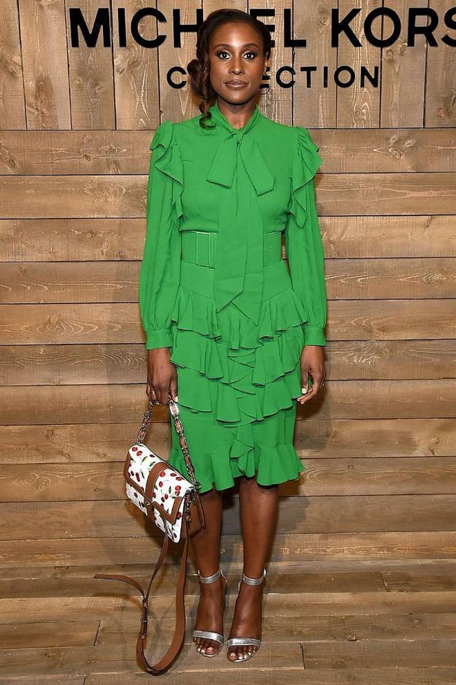 Issa Rae went bright in a green ruffled dress and metallic sandals.

Photo: Jamie McCarthy / Getty
