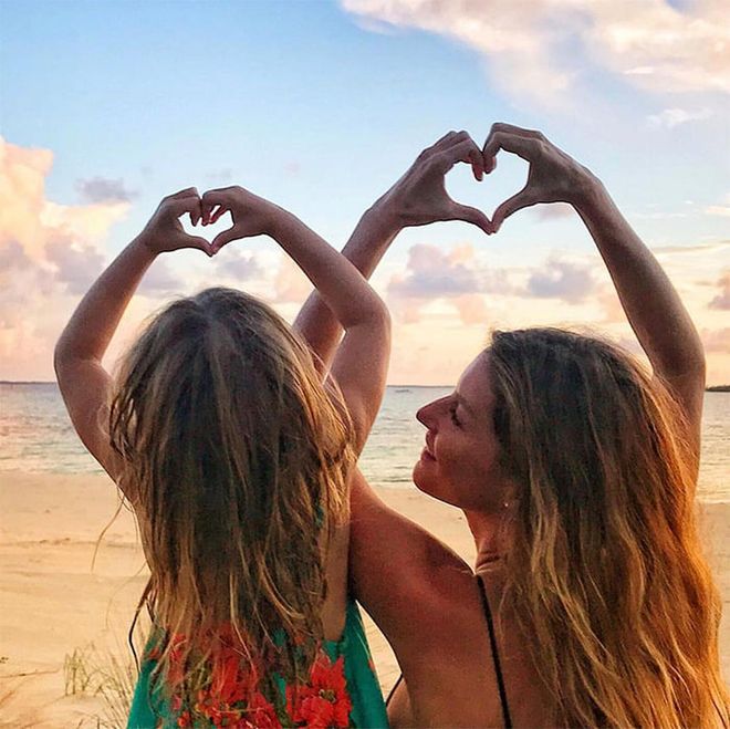 The supermodel poses with her daughter and urges for "more love, more compassion, more respect, more equality, more support."