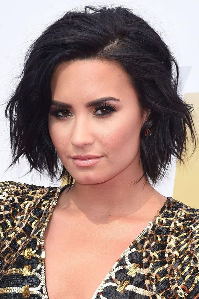 Demi Lovato's deep shade of brunette still feels light and airy thanks to piece-y ends.

Photo: Getty