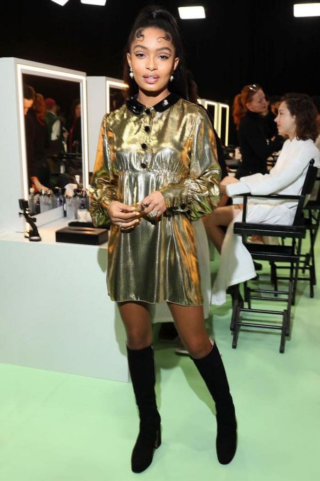 Yara Shahidi made a case for knee-high boots, which she wore with a golden mini-dress at Gucci.

Photo: Victor Boyko / Getty