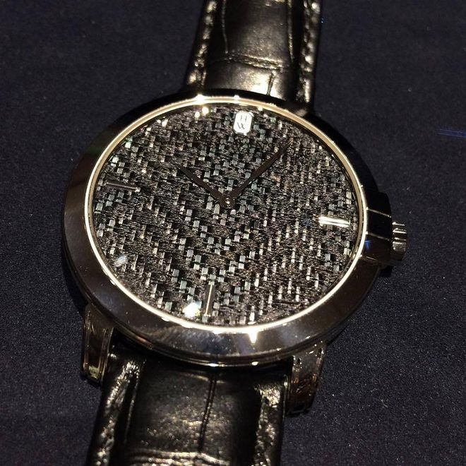 A metier d'Art dial that shows strips of black Tahitian mother-of-pearl woven with silk thread