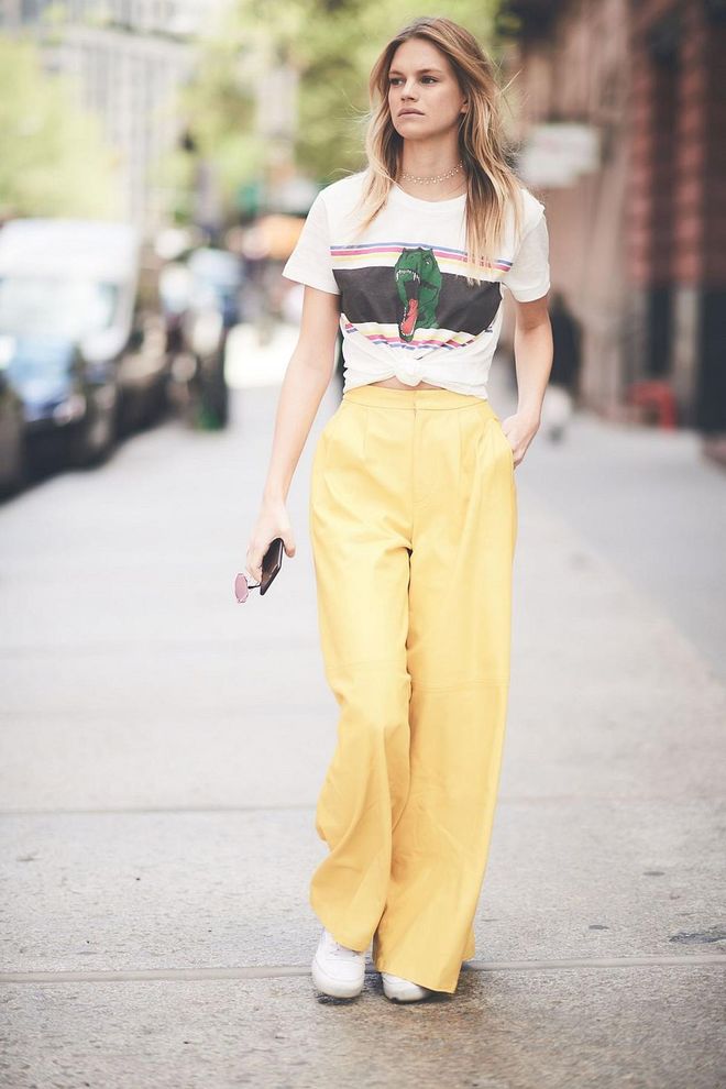 For a low-key approach to the wide-leg trouser, turn to model Nadine Leopold who teams hers with a relaxed T-shirt. Photo: Getty 