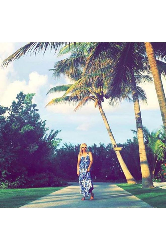 The actress poses in one of her Draper James sundresses while vacationing in the Bahamas. —@reesewitherspoon Photo: Instagram