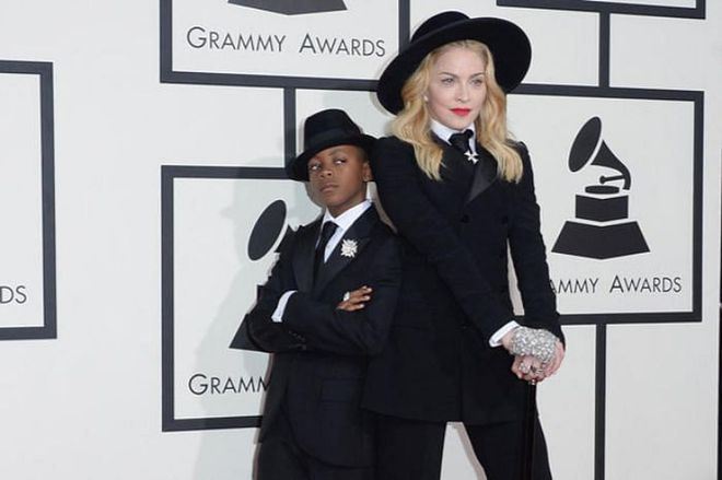 At the 2014 Grammy awards, Madonna wore an identical black tailored suit get up and wide brimmed hats with her adopted son, David. The stylist? None other than the then 8-year-old himself.

Photo: Getty