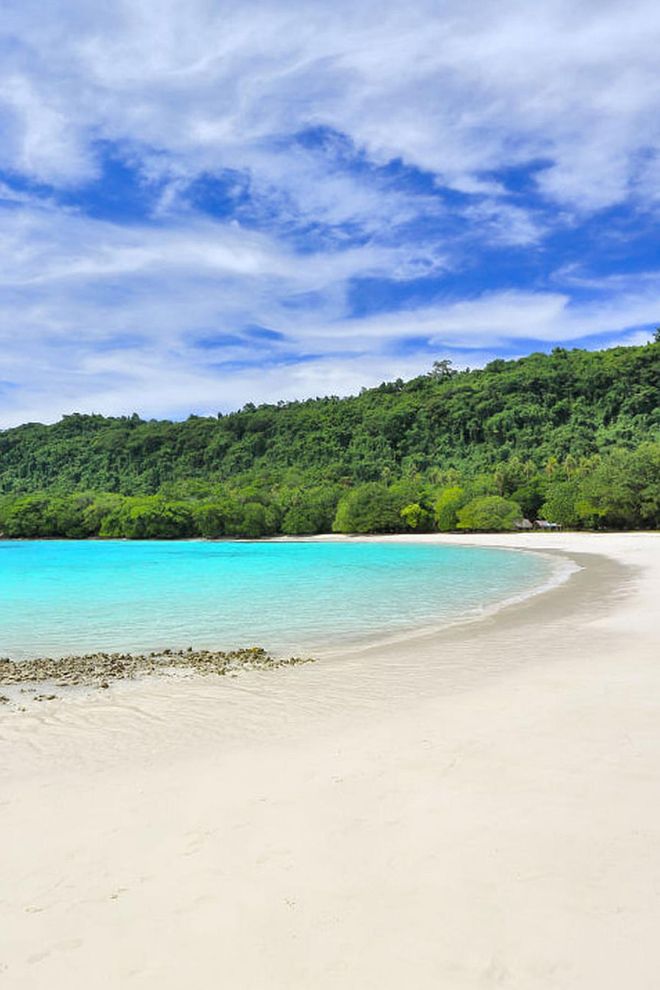 If you're looking to go off the grid, head to this remote white sand beach on Espiritu Santo Island in the South Pacific.