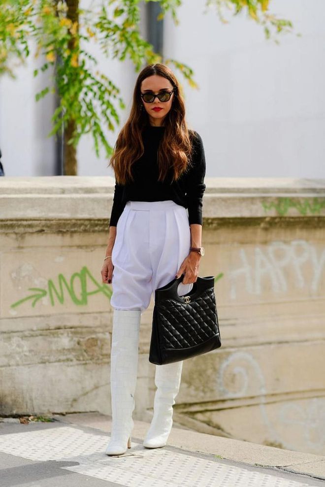 A fabulous white boot is the exact outfit game changer you need now. The higher than better.