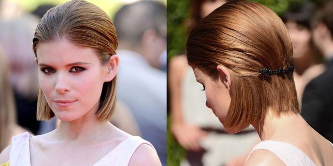 Sleek is chic according to Kate Mara. Try a classic half up, half down style with hair pulled low behind the ears. An embellished barrette adds a finishing touch.
