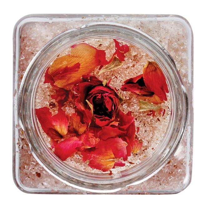 With crushed rose petals mixed with organic essential oils, raw honey and vitamin E, this luscious scrub not only softens skin but also stimulates circulation. 