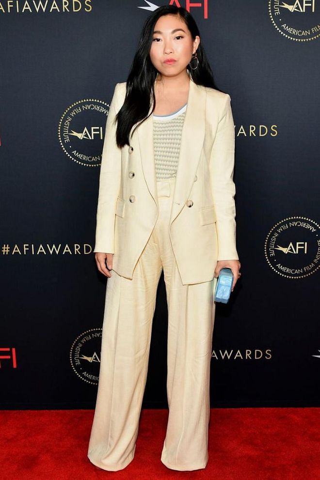 Awkwafina arrived in a lemon yellow trouser suit.

Photo: Amy Sussman / Getty