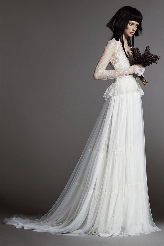Take the idea of an over-the-top ball gown with all the fixings: lace, a peplum, long sleeves, a plunging neckline- and relax it. Applying that logic to any style will take a style from ballroom to bucolic. Vera Wang Bride "Madeleine" gown, verawang.com. 