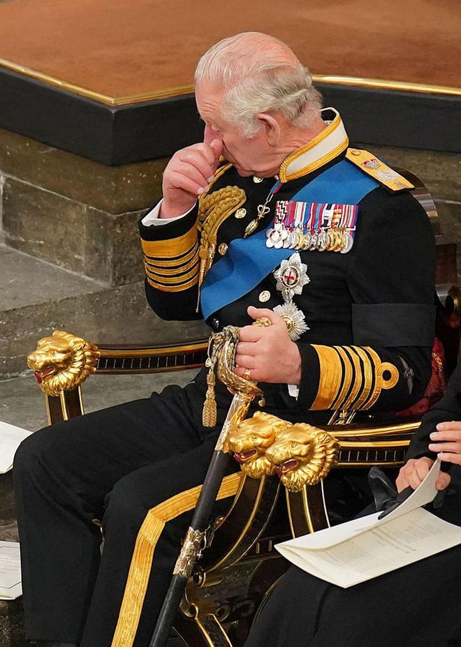 King Charles III reacts during the state funeral of the Queen
