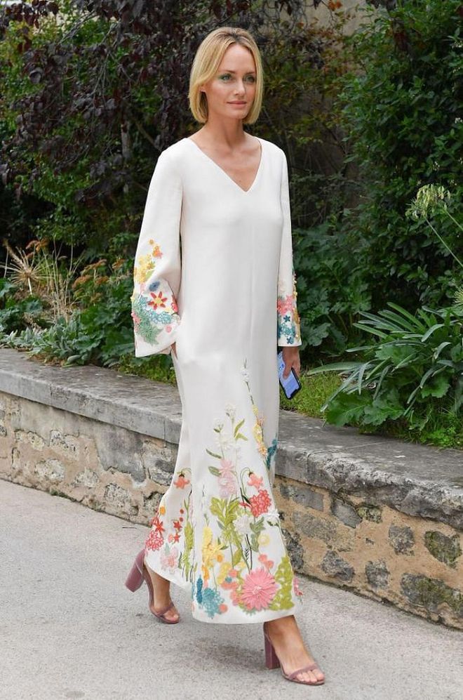 Amber Valletta looked elegant in a white dress with embellished detail.

Photo: Getty
