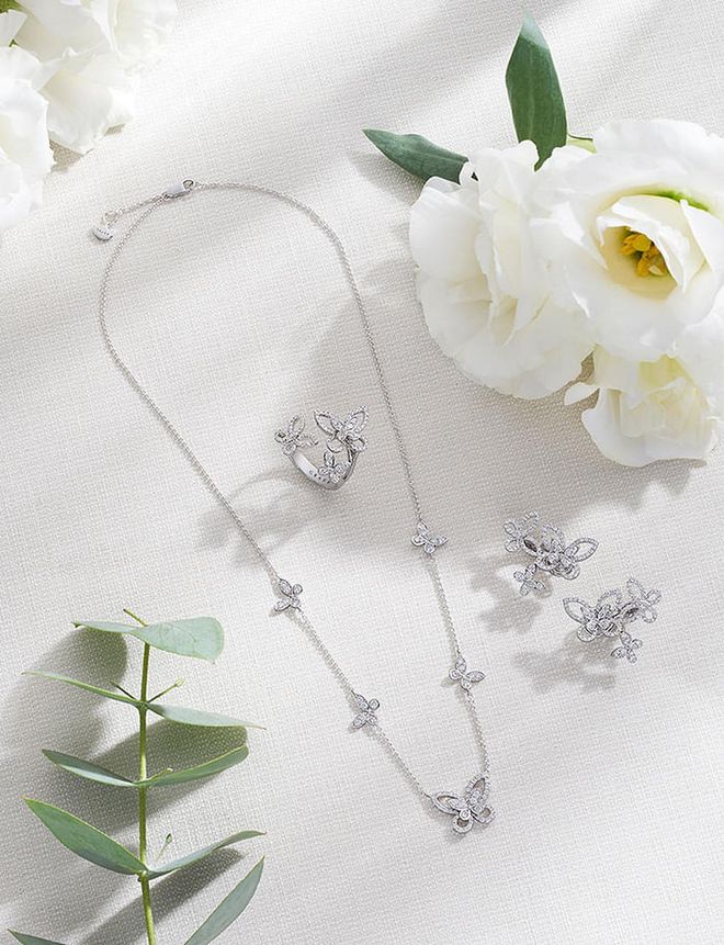 From left: GRAFF Butterfly Silhouette Collection pavé diamond necklace, $12,000; pavé diamond ring. $11,000; pavé diamond earrings, $18,000.