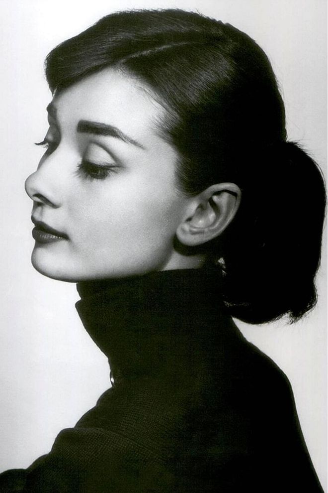 Hepburn's signature casual updo paired with a defined side part feels like a perfect match with today's boy-meets-girl fashions.