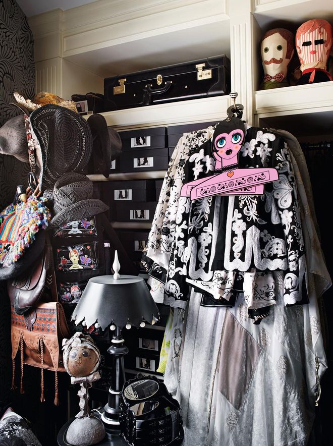 “When my closet downstairs overflowed, my contractor built me this one,” Anna says of her expansive fashion archive. 