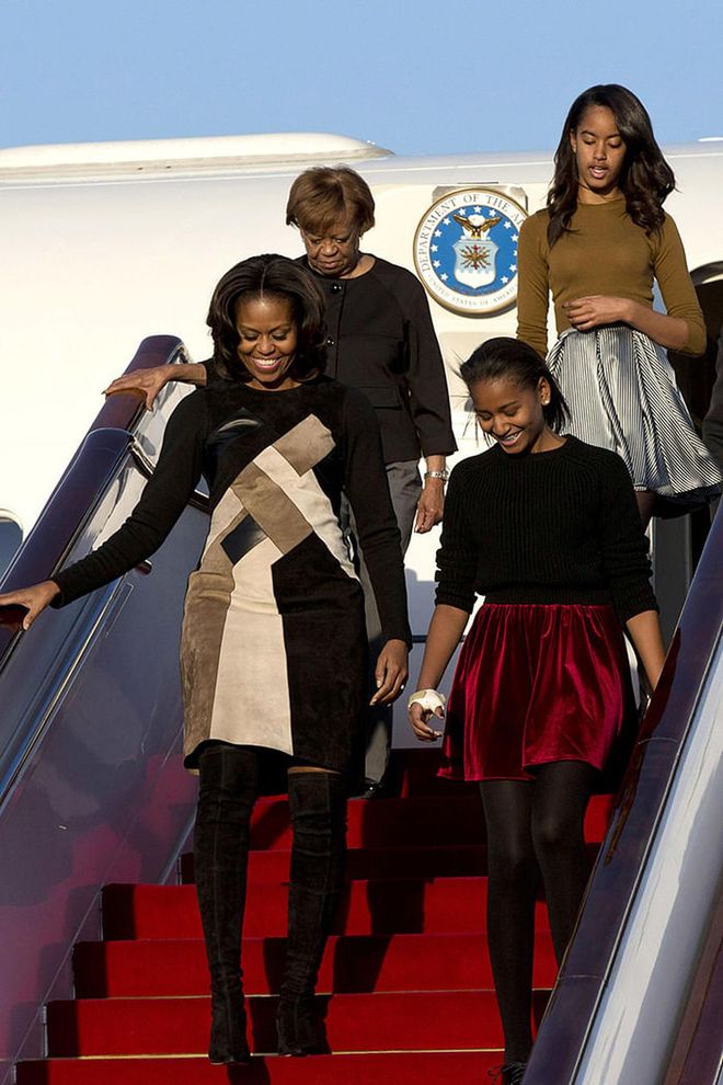 Arriving in Beijing, China for the First Lady's week-long tour. Photo: Getty