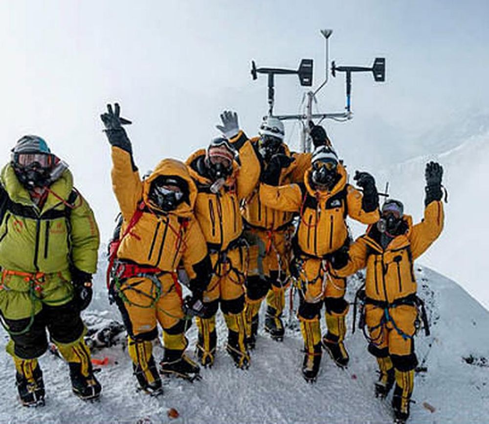 Members of the multidisciplinary team pose for a portrait after successfully installing weather stations on Mt Everest. <br />Photo: Courtesy of the National Geographic Society