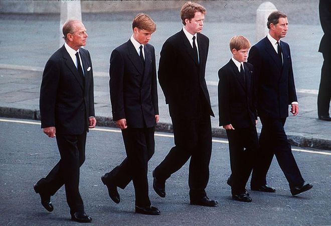 Prince Philip, Prince William, Earl Spencer (the younger brother of Princess Diana), Prince Harry, and Prince Charles follow the coffin of Princess Diana at her funeral.