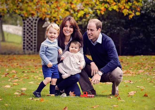 The Duke and Duchess of Cambridge are all smiles with their two children in late October 2015 at home at Kensington Palace. The family chose this portrait for their Christmas card later that holiday season.