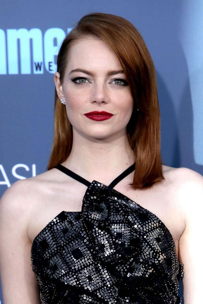 Redheads can (and should) wear red lipstick—just look at Stone.
