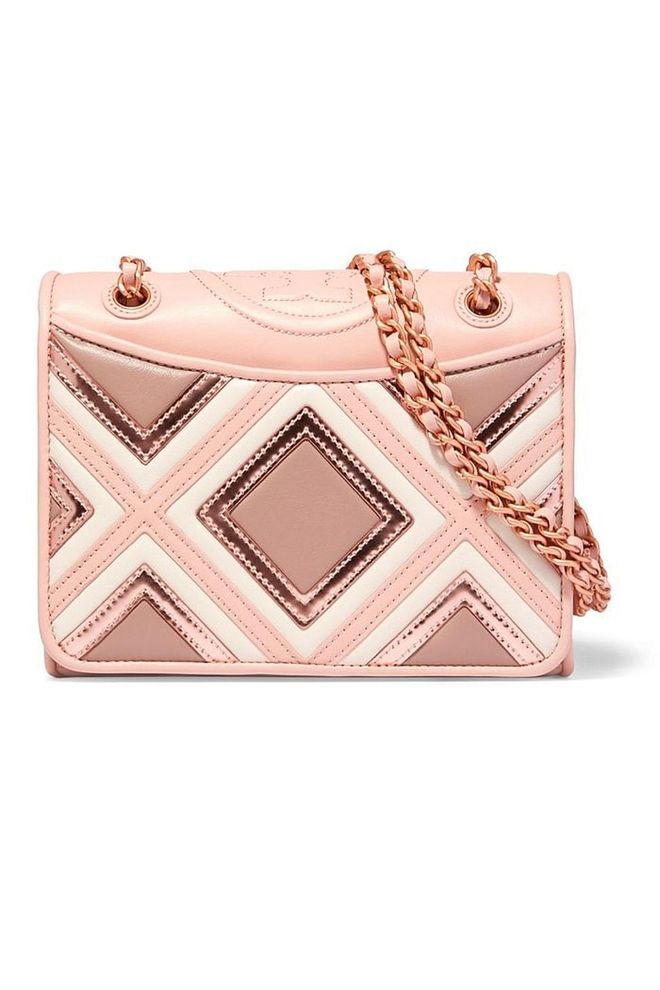 Add a pop of pattern to any winter ensemble with Tory Burch's shoulder bag.
