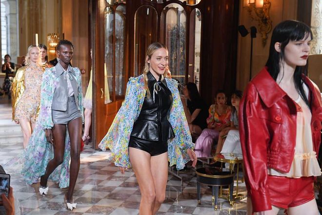 The model and actress stuns in leather shorts for Miu Miu.

Photo: Getty