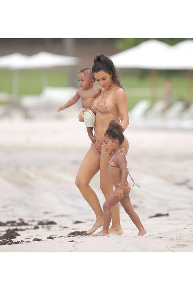 While vacationing in Punta Mita, Mexico, Kim and North step out in matching mommy and me nude crochet bikinis. 