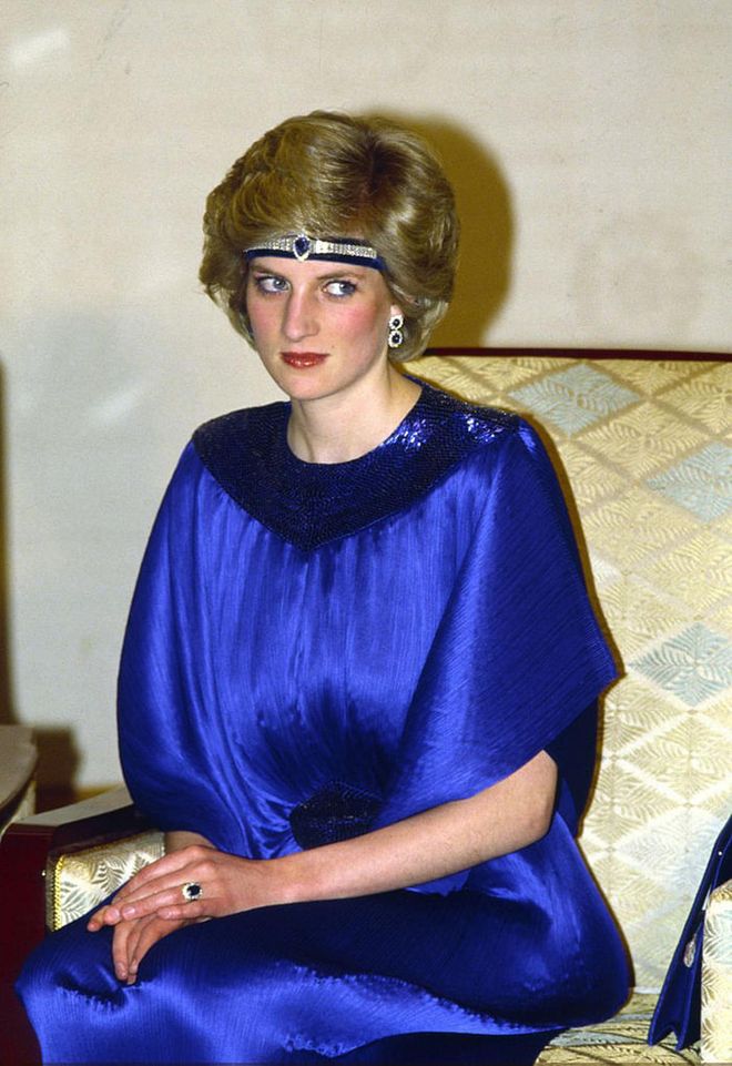 Ever the visionary, Diana had the sapphire ring from the Saudi set fashioned into the centerpiece for a choker which she also wore as a headband. Likewise, the diamond-studded sapphires from the set's watchband were remade into two pairs of earring, one of which William gave to Kate shortly after their engagement. If the other set goes to Meghan, it would bring a stunning symmetry to Diana's sons' marriages.
Photo: Getty 