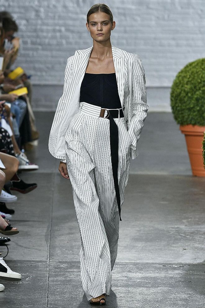 Key pieces: a statement pencil skirt, boat-necked or voluminous-sleeved tops, pinstripe tailoring
Photo: Getty