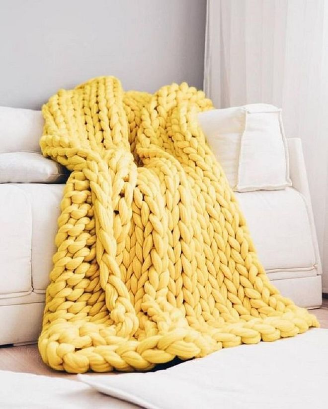 Another home decor trend that will inspire you to pick up a new hobby, snuggle up on cosy throws, cushion covers, blankets and more. Photo: Pinterest