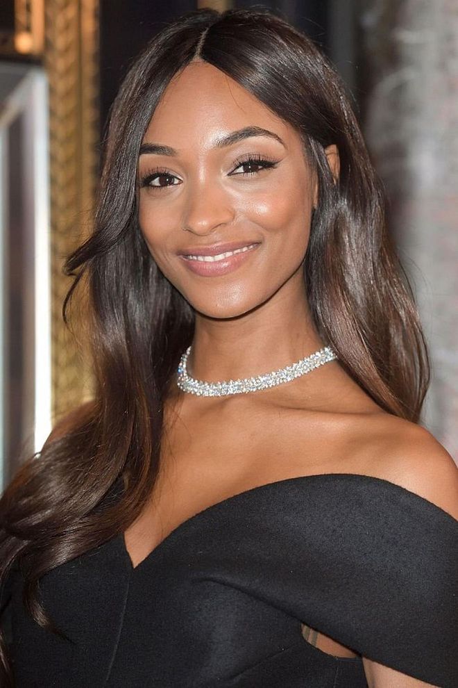 Jourdan Dunn goes glam with tumbling polished waves. Photo: getty 