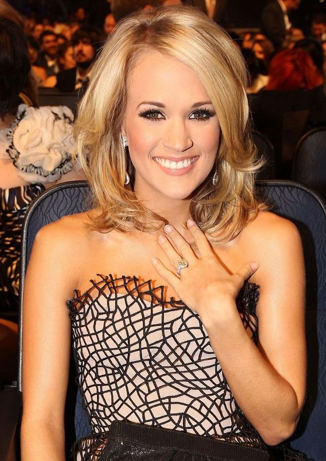 Mike Fisher proposed to Carrie Underwood with the prettiest, most unique ring: a 5-carat, canary-and-white diamond that cost $150,000 (£115,839).