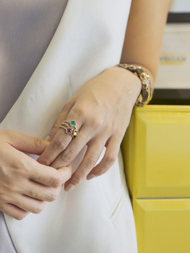 Singapore Designer Choo Yilin's gold Peranakan Pop rings with green onyx, peridot and amethyst 