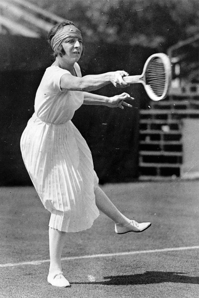 Twenty odd years later French tennis player Suzanne Lenglen made corsets a thing of the past and boldly strode on court in an airy ankle length frock. Need we say that she wore short sleeves? Photo: Getty