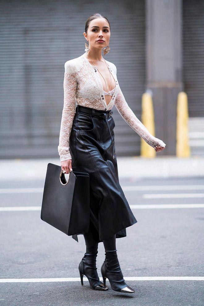 Olivia Culpo wearing Nina Ricci with a Salvatore Ferragamo handbag in SoHo of New York City. Photo: Getty