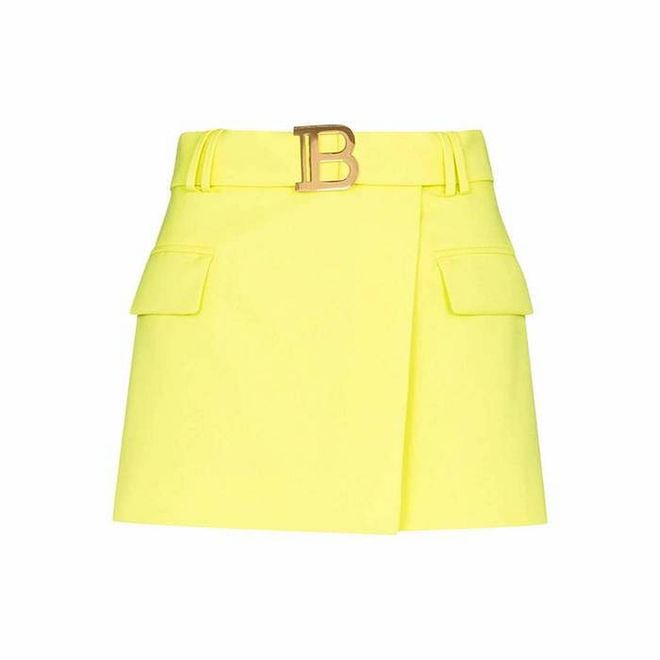 B Buckle Mini Skirt, $1,312, Balmain at Farfetch