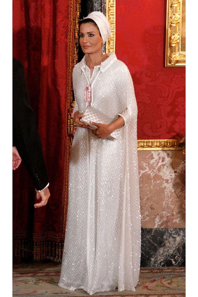 She's often cited as one of the most elegant women the world. For an official engagement in Spain (pictured here), she wore custom Chanel couture.