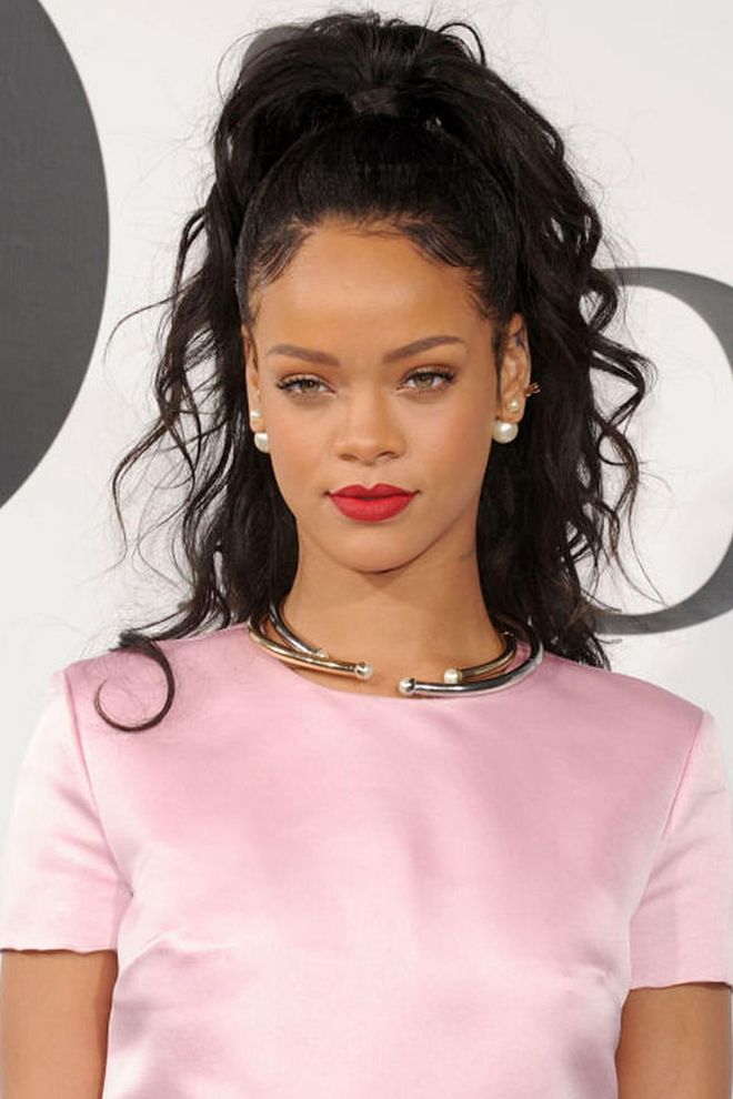 Is there anything Rihanna can't pull off? Her take on the half up/half down hair comes with some loose curls in a bedhead effect. Photo: Getty