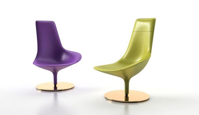 The new sculptural Venus chairs is available in several jewel tones. (Photo: Versace)