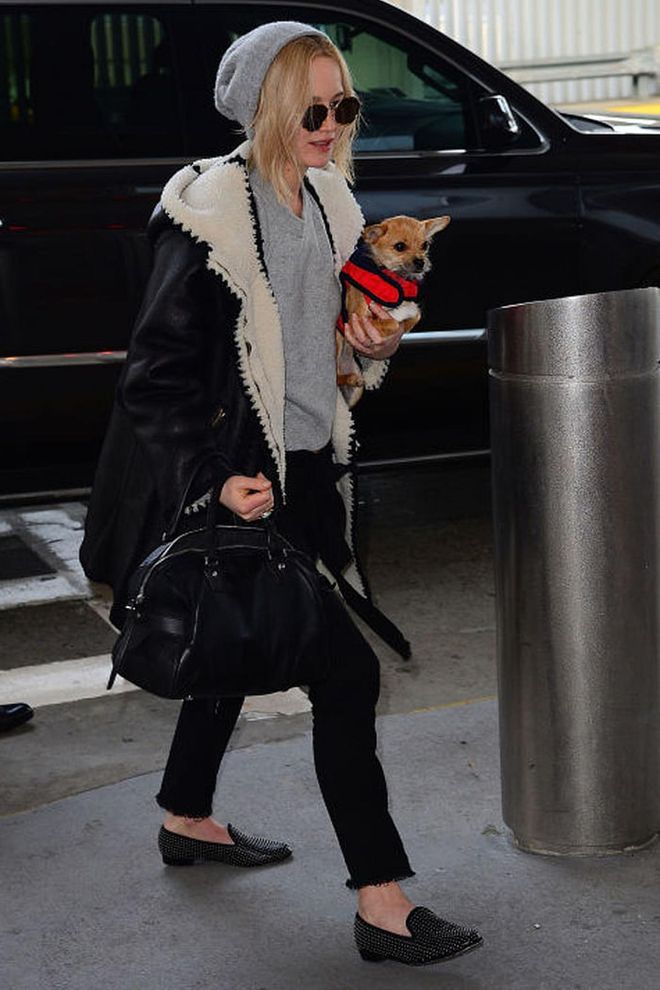 Jennifer Lawrence looked laid-back in shearling for a trip. Photo: Getty