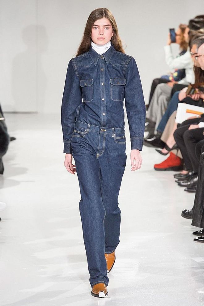 The invention of jeans incited jealousy even in the late, great Yves Saint Laurent, so it's no surprise that designers continue going to the denim well for inspiration. For Fall, that means double denim in crisp salvage, distressed black, fur lined, embroidered and more. 
Pictured: Calvin Klein 