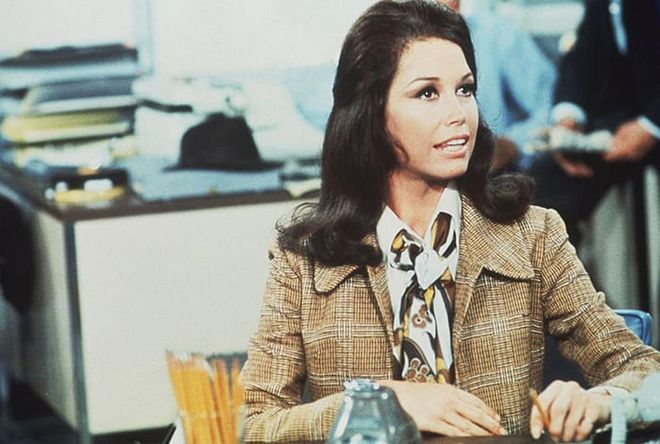 The poster child for single, independent women everywhere, Mary Tyler Moore was a TV icon in more than one right. Aside from her groundbreaking feminist sitcom, Moore had a working woman's wardrobe that lit up the office.

Photo: Getty