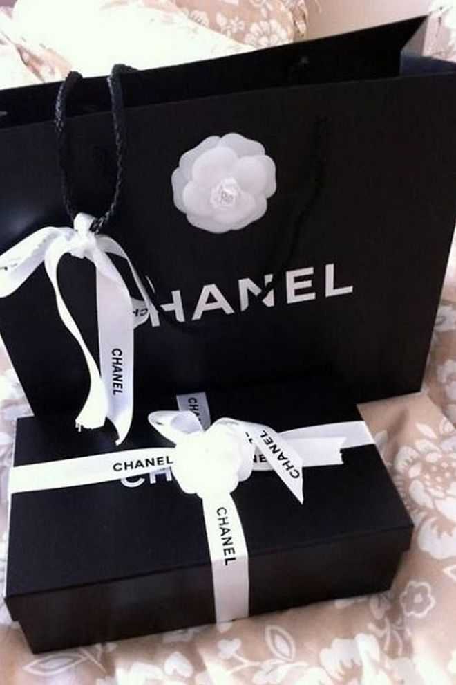 Every Chanel shopping bag is decorated with a white Camellia, which was Coco Chanel's favourite flower. Die hard Chaneliacs collect these too.