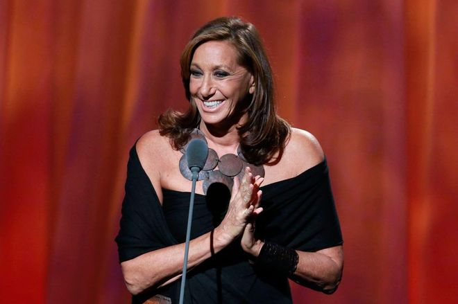 Designer Donna Karan speaks at the Clinton Global Citizen Awards, held during the second day of the Clinton Global Initiative 2012 (CGI) in New York, September 24, 2012. The CGI, which runs through September 25, was created by former U.S. President Bill Clinton in 2005 to gather global leaders to discuss solutions to the world's problems. REUTERS/Andrew Burton (UNITED STATES - Tags: FASHION POLITICS BUSINESS) - RTR38DML