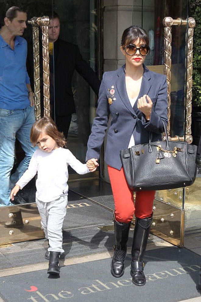 The reality TV star steps out with Mason and her beloved Birkin in London. 
Photo: Getty