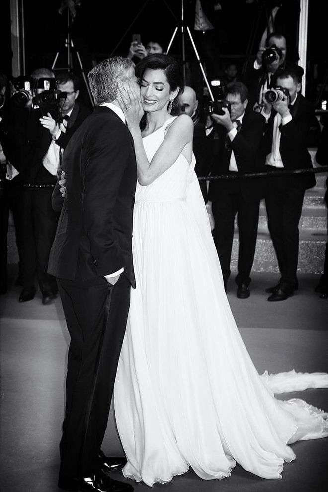 Sharing a moment during the 69th annual Cannes Film Festival this past May. Photo: Getty 