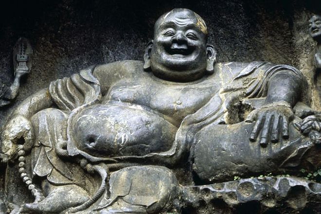 Rubbing the belly of a laughing buddha is a long-held tradition for courting good fortune, but the numerous buddha statues at this large monastery in southeast China may have a belly up on the rest. Legend has it that the buddha figure from the series of rock carvings named "The Peak That Flew Hither," outside of the temple entrance is the origin of the tradition, inspiring luck-hungry visitors from all over the globe to come and give the buddha a friendly pat.

Photo: Getty